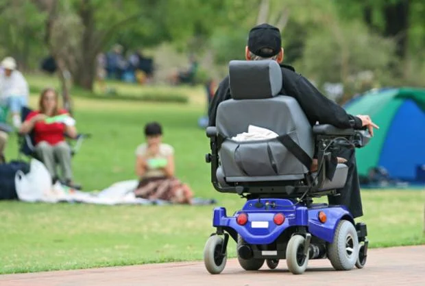 electric-wheelchair-user.jpg