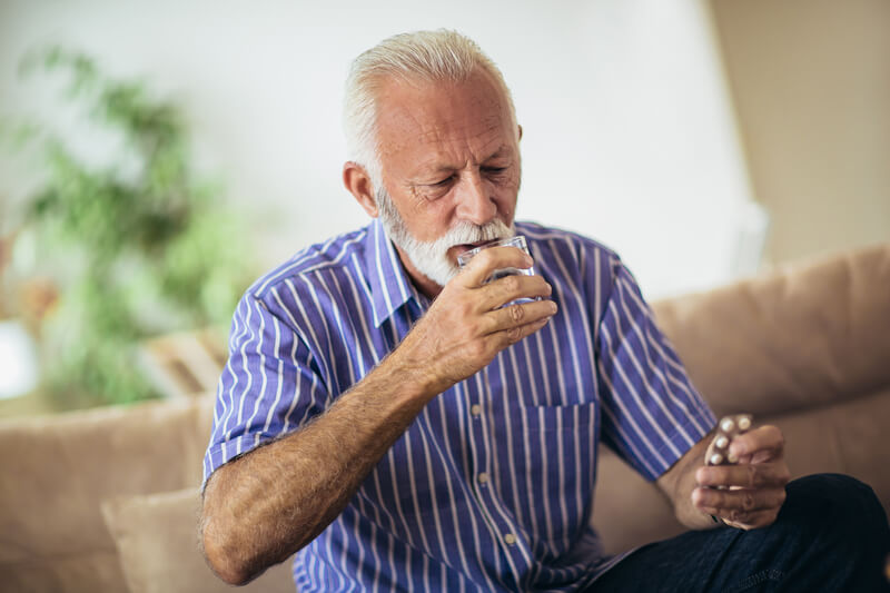 Man taking daily medication