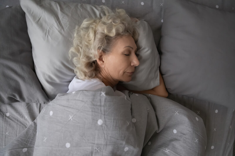 Woman sleeping in bed